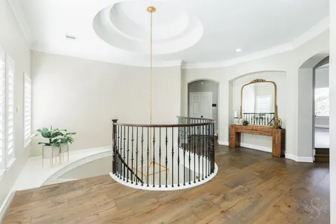 a view of livingroom with furniture and staircase
