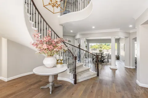 a view of entryway with wooden floor
