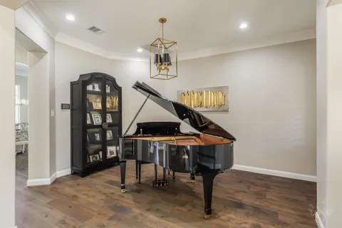 a view of entryway wih livingroom and stairs