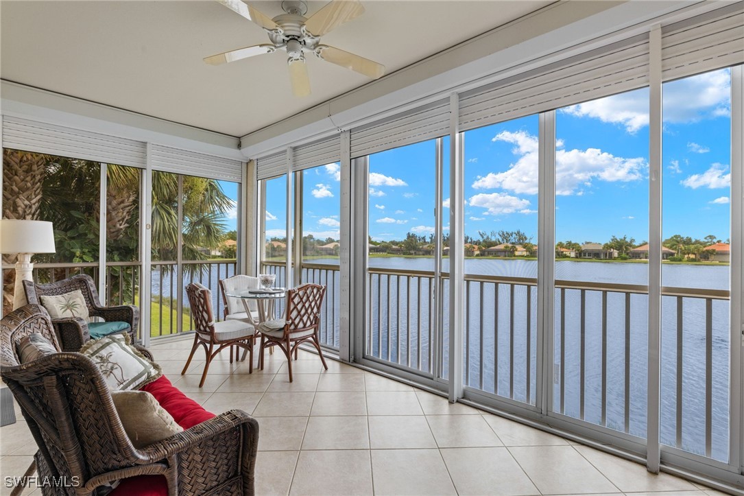 16253 Coco Hammock Way, Unit 201 Fort Myers, FL 33908 - Photo 25 of 34 a dining room with furniture water view and balcony
