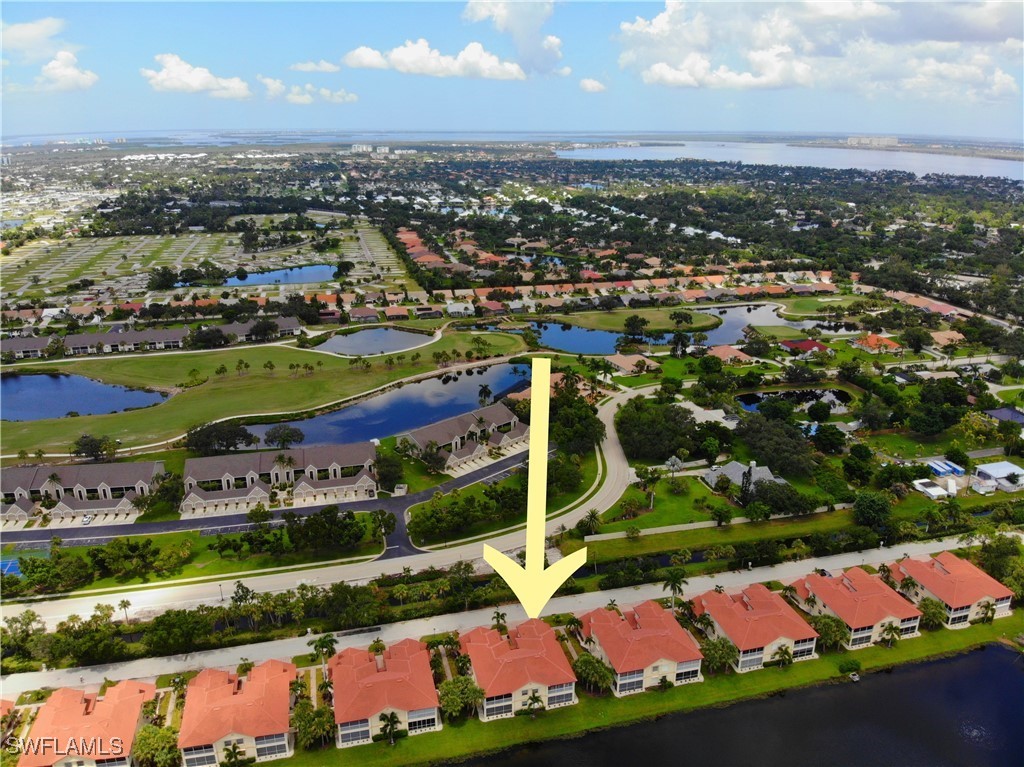 16253 Coco Hammock Way, Unit 201 Fort Myers, FL 33908 - Photo 30 of 34 an aerial view of a city