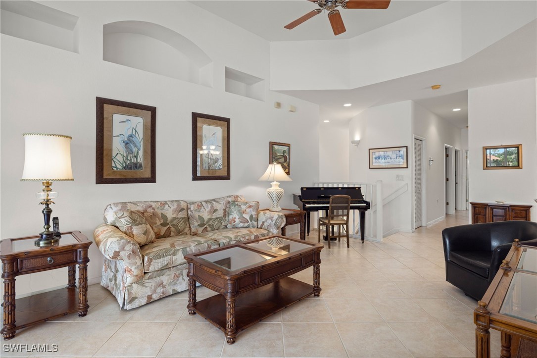16253 Coco Hammock Way, Unit 201 Fort Myers, FL 33908 - Photo 9 of 34 a living room with furniture