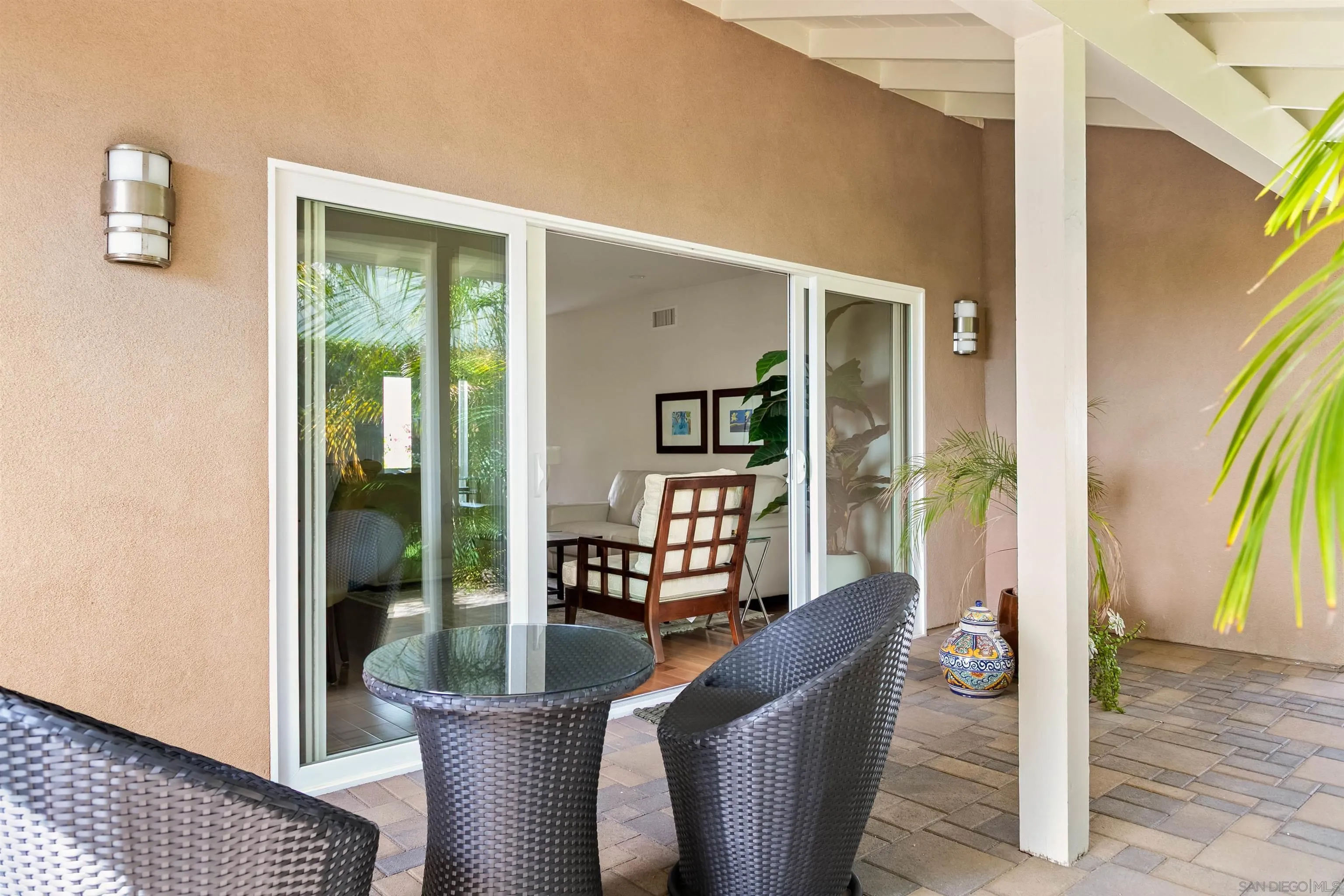 5958 Sagebrush Road La Jolla, CA 92037 - Photo 23 of 56 Covered patio area off the living area surrounded by lush landscaping
