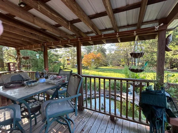 a view of porch with seating area
