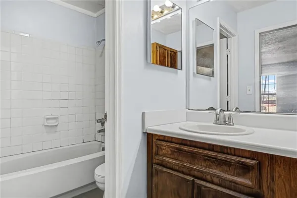 a bathroom with a sink and a bathtub