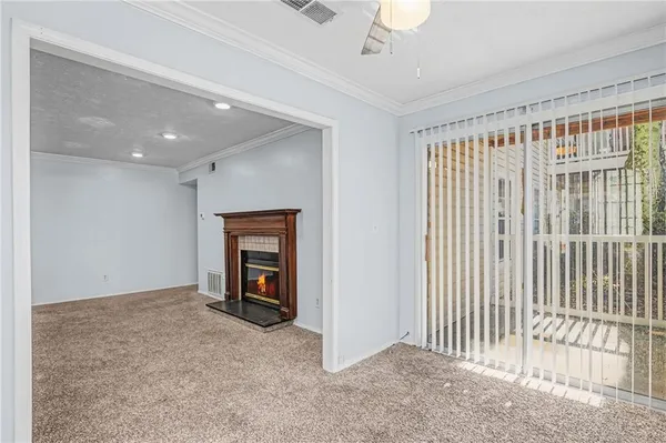 a view of a livingroom with a fireplace