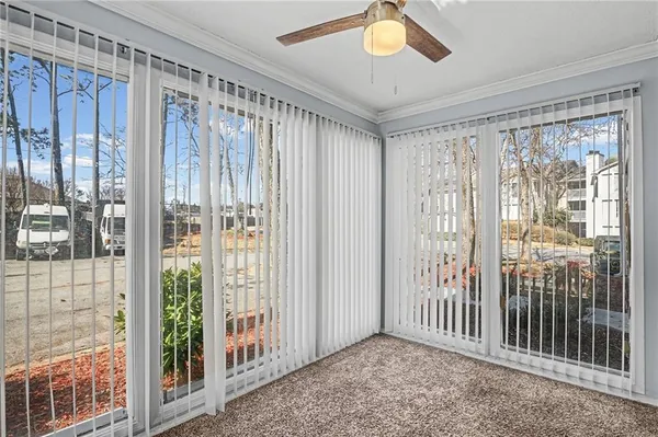 a view of a room with windows