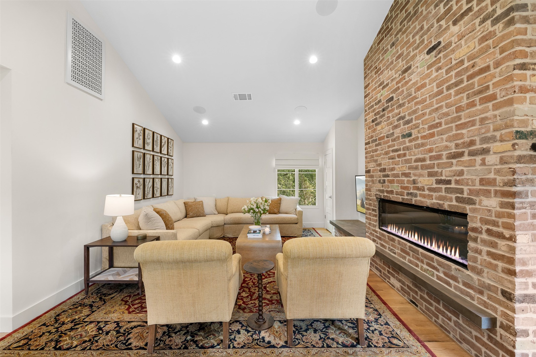 565 Bybee Road Round Top, TX 78954 - Photo 13 of 30 a living room with furniture and a fireplace