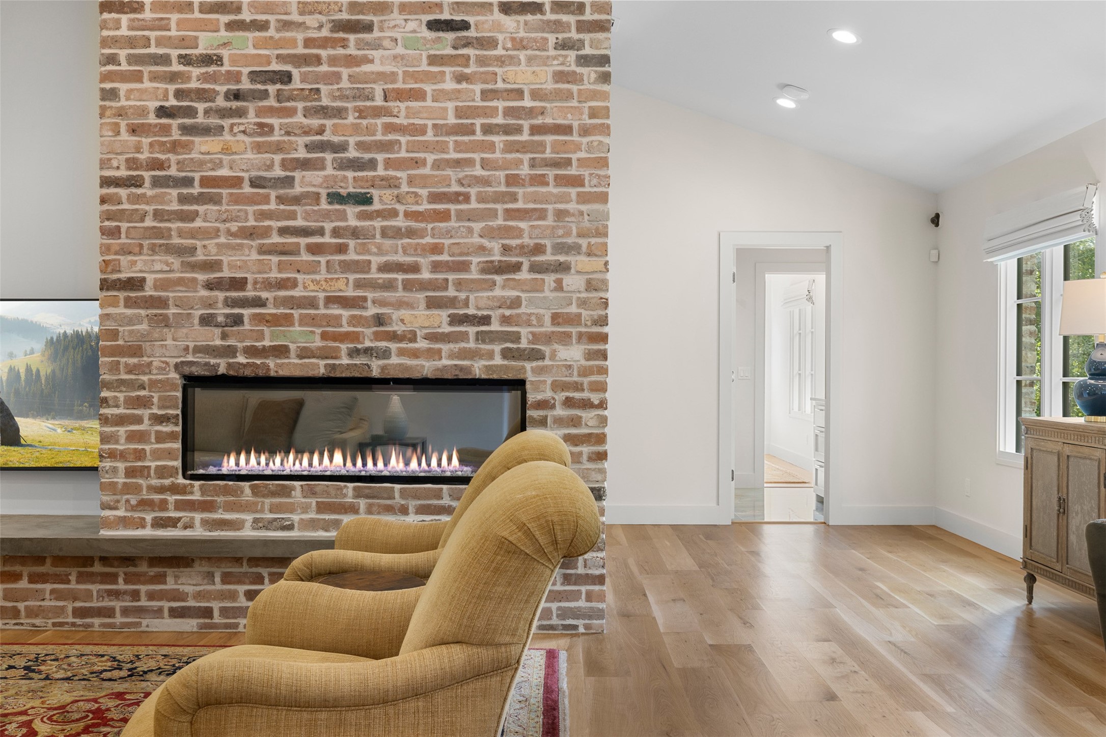 565 Bybee Road Round Top, TX 78954 - Photo 14 of 30 a view of livingroom with furniture and a fireplace