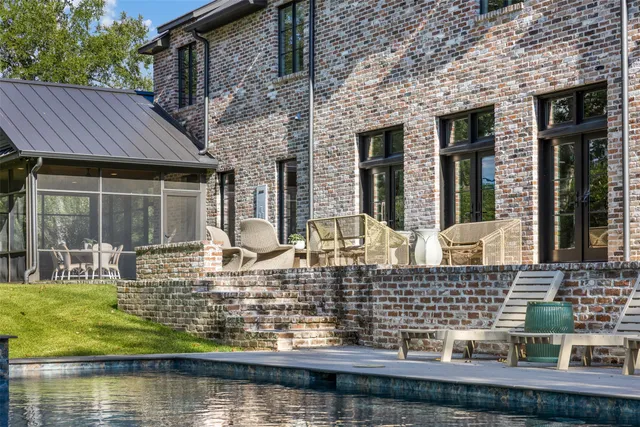 front view of a house with a large window