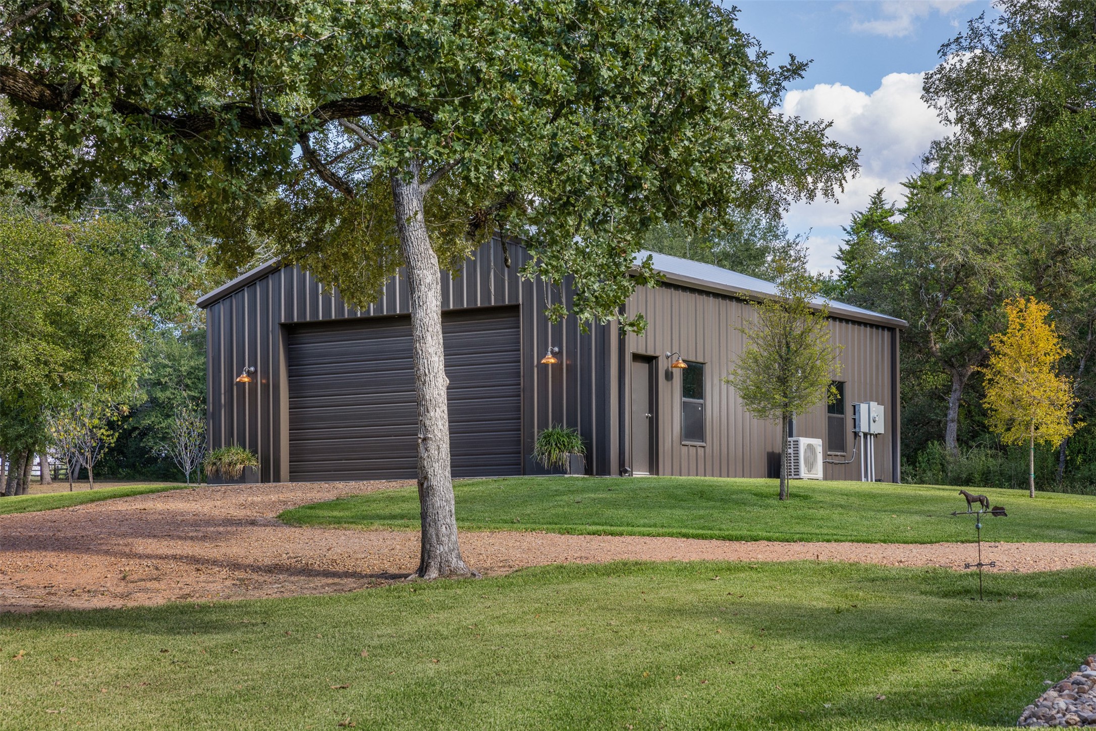 565 Bybee Road Round Top, TX 78954 - Photo 24 of 30 a view of a house with a yard