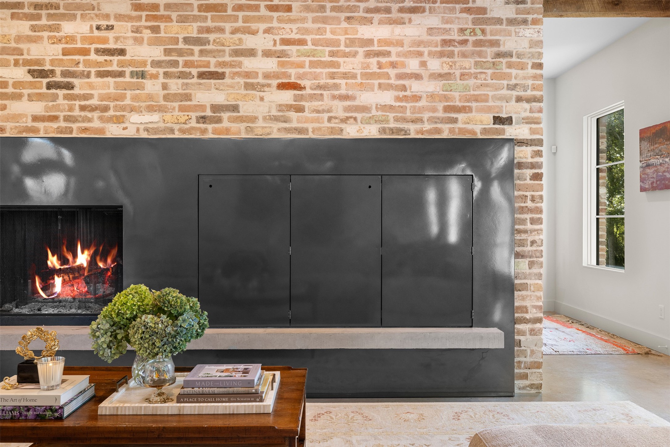 565 Bybee Road Round Top, TX 78954 - Photo 7 of 30 a view of fireplace and potted plants