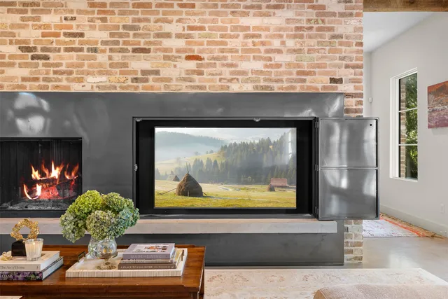 a living room with fireplace