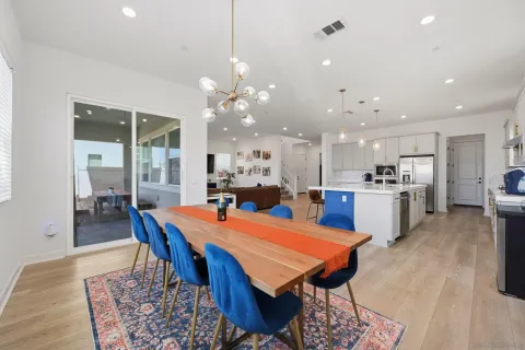 a living room with furniture and windows