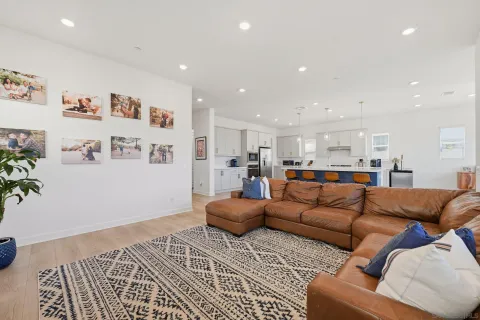 a bedroom with a bed and a couch