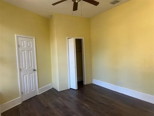 a view of a livingroom with wooden floor