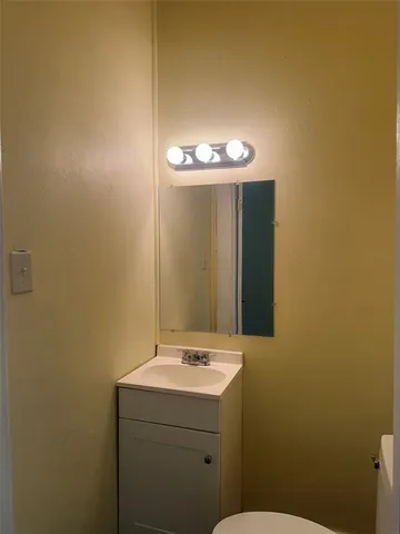 a bathroom with a sink and a toilet