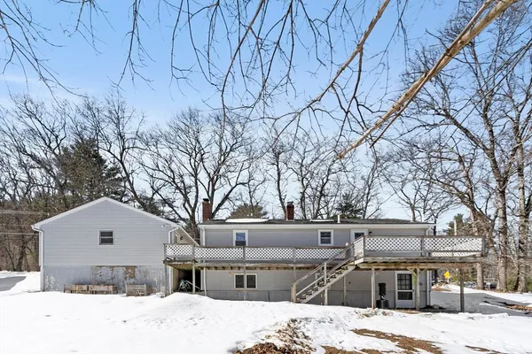 a view of a house with snow on the wall