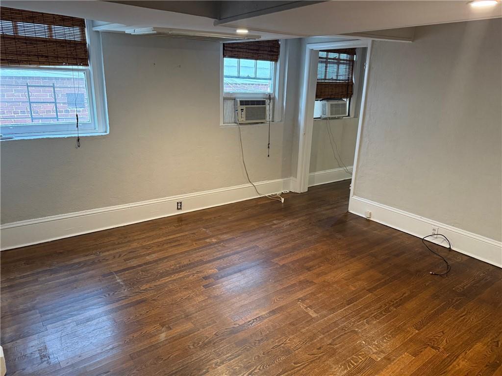 846 Briarcliff Road Northeast Atlanta, GA 30306 - Photo 18 of 22 an empty room with wooden floor and windows