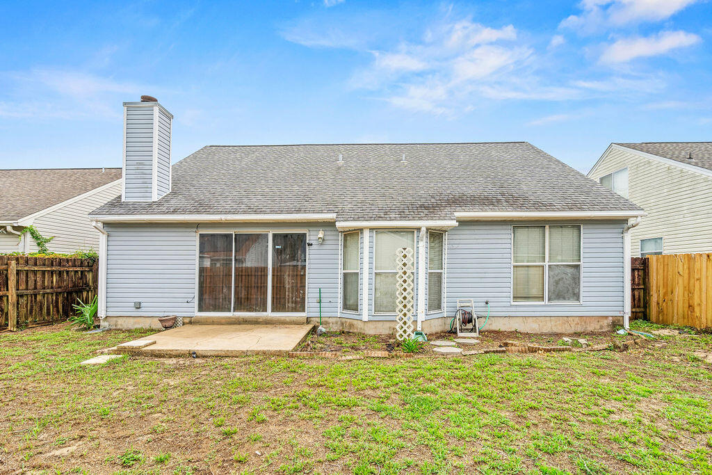 53 4th Street Shalimar, FL 32579 - Photo 35 of 47 a front view of a house with a yard