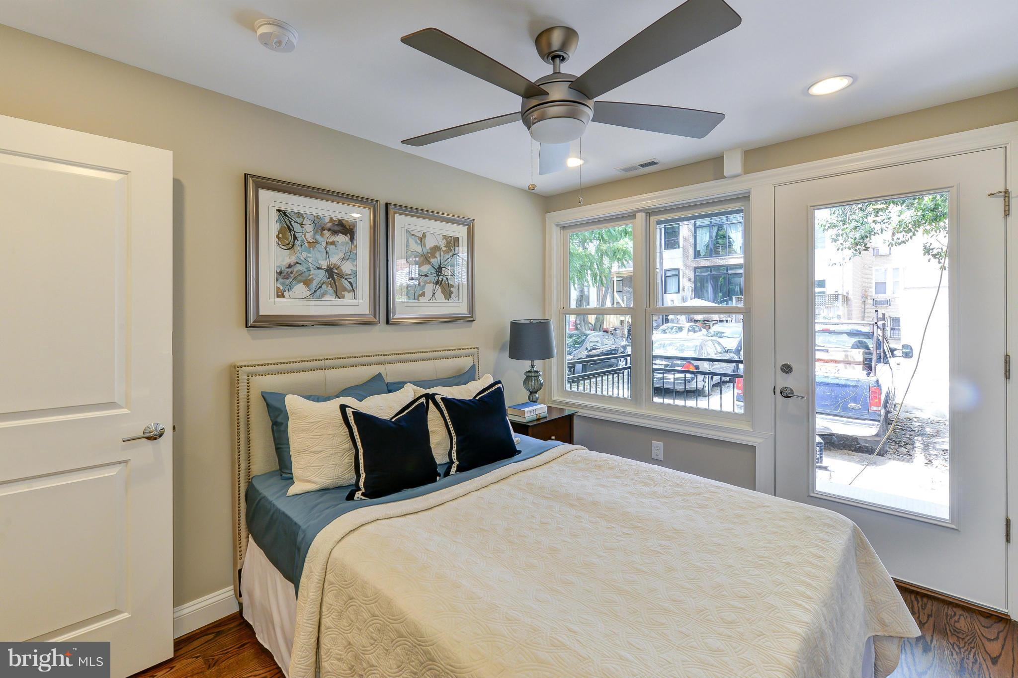 1823 S Street Northwest, Unit 3 Washington, DC 20009 - Photo 18 of 24 a bedroom with a large bed and a window