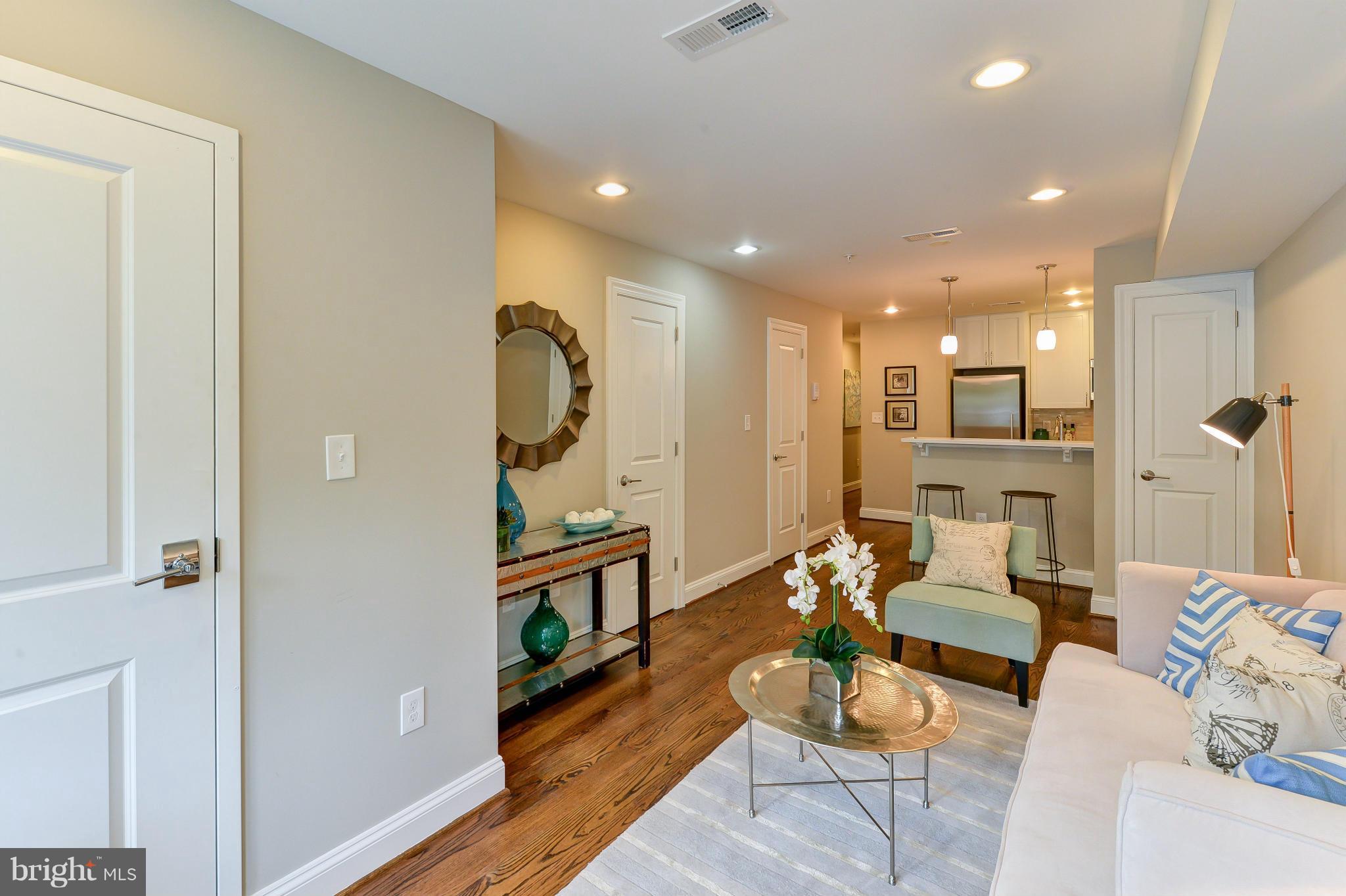 1823 S Street Northwest, Unit 3 Washington, DC 20009 - Photo 8 of 24 a living room with furniture
