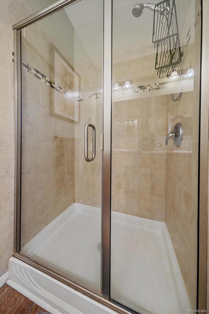 147 Overlook Drive Bailey, CO 80421 - Photo 19 of 43 a bathroom with a shower