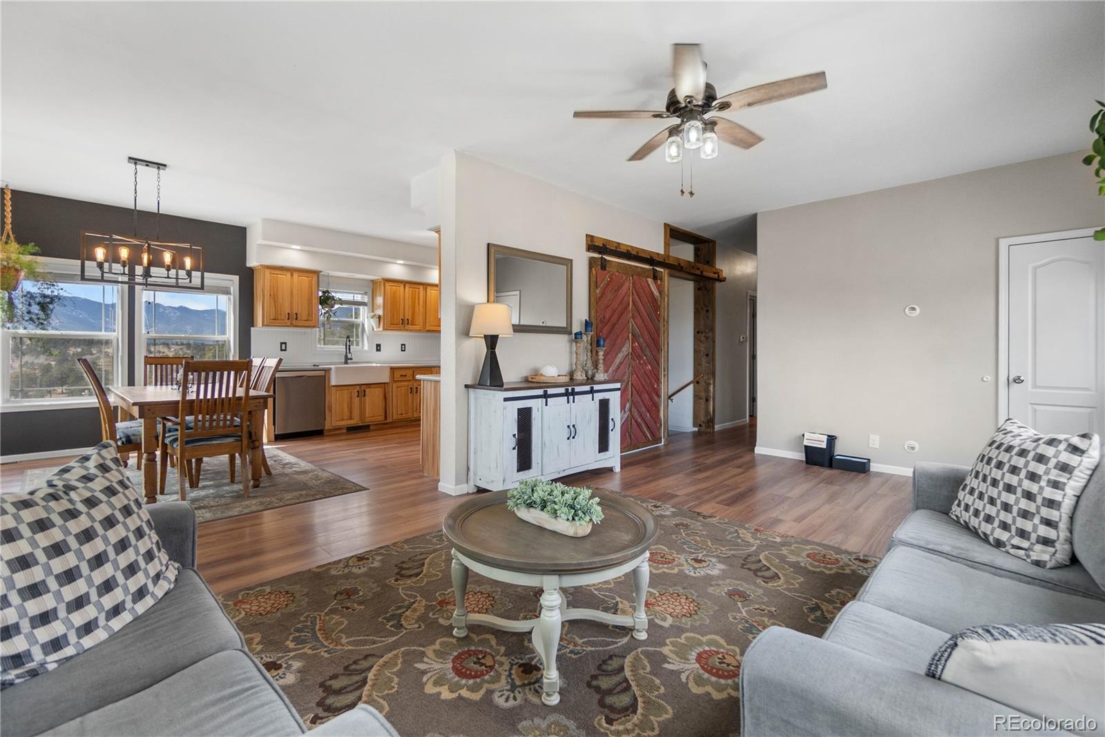 147 Overlook Drive Bailey, CO 80421 - Photo 7 of 43 a living room with furniture and kitchen view