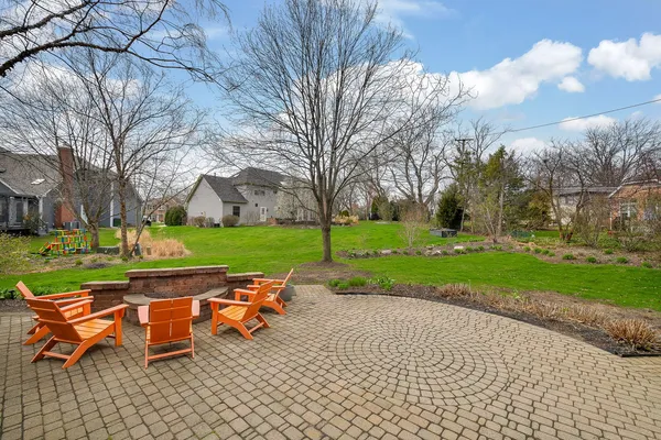 a view of a park with sitting area