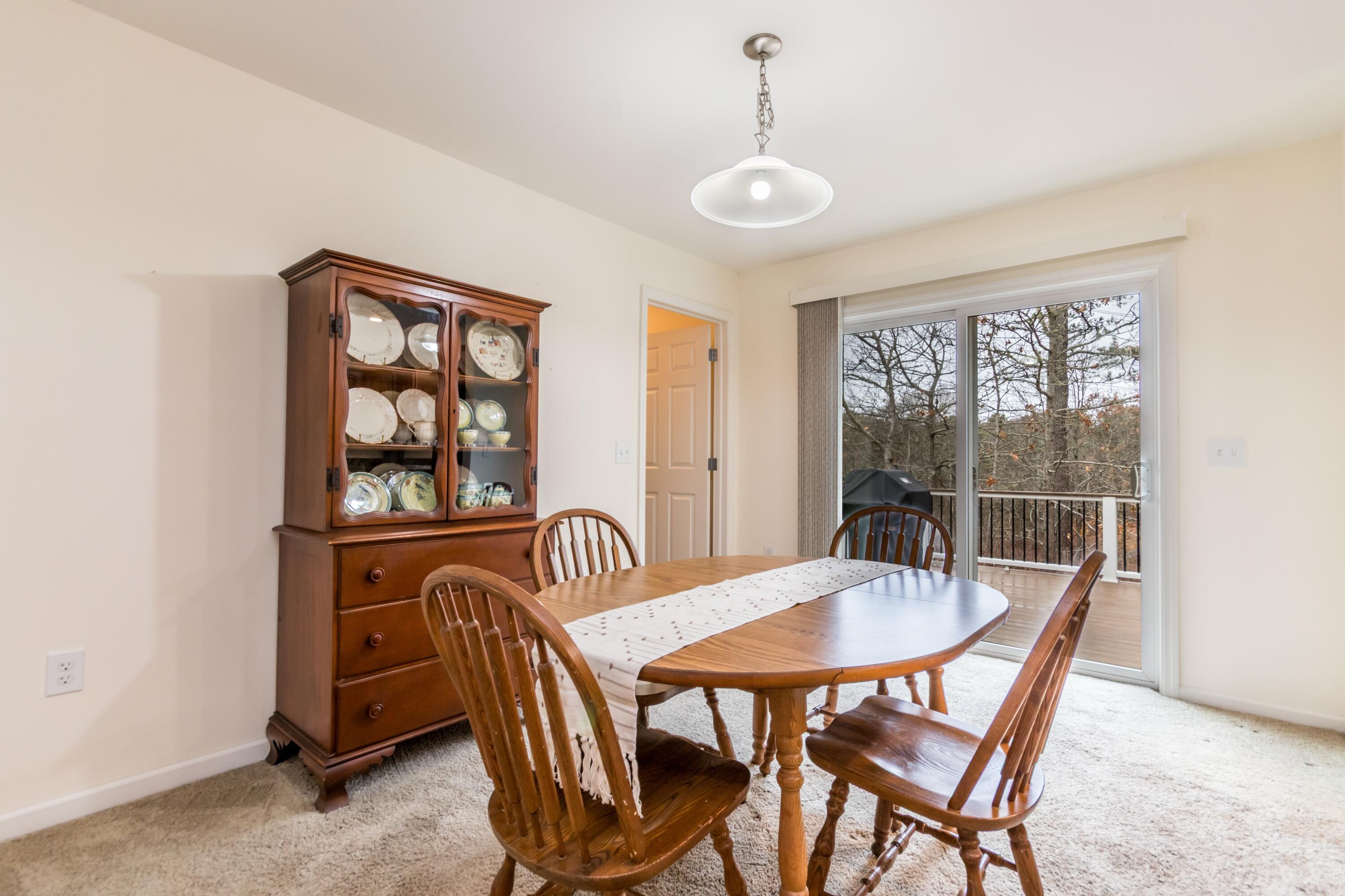 98 Leland Road Brewster, MA 02631 - Photo 11 of 38 Dining with slider to deck