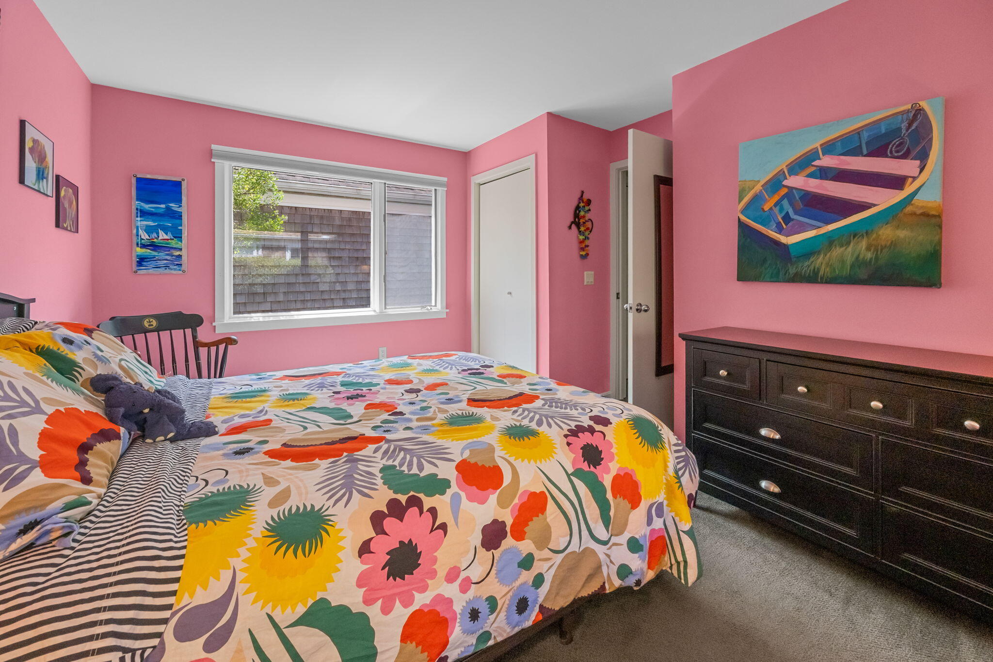 11 Juniper Circle, Unit 11 Brewster, MA 02631 - Photo 20 of 52 a bedroom with a bed and a dresser