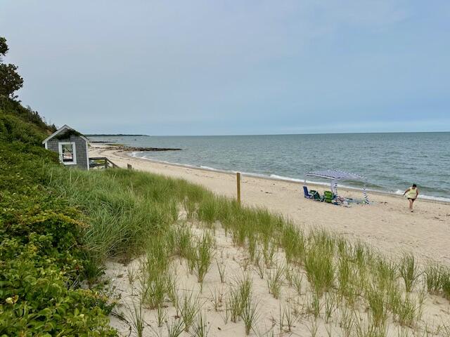 11 Juniper Circle, Unit 11 Brewster, MA 02631 - Photo 37 of 52 a view of a swimming pool and an outdoor seating