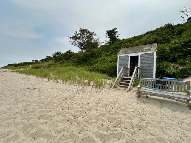 11 Juniper Circle, Unit 11 Brewster, MA 02631 - Photo 39 of 52 a view of a house with backyard and a patio