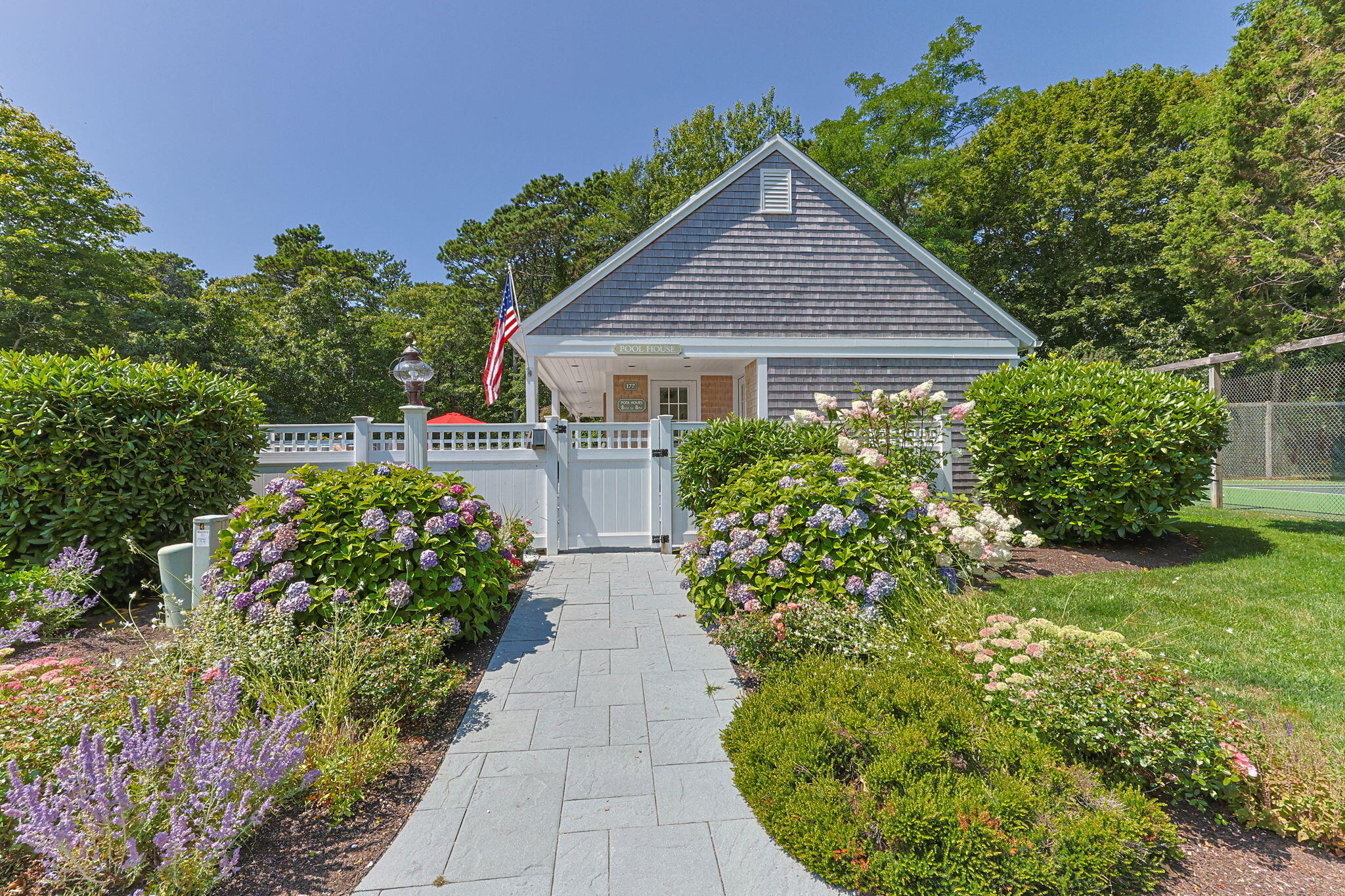 11 Juniper Circle, Unit 11 Brewster, MA 02631 - Photo 47 of 52 a house view with a garden
