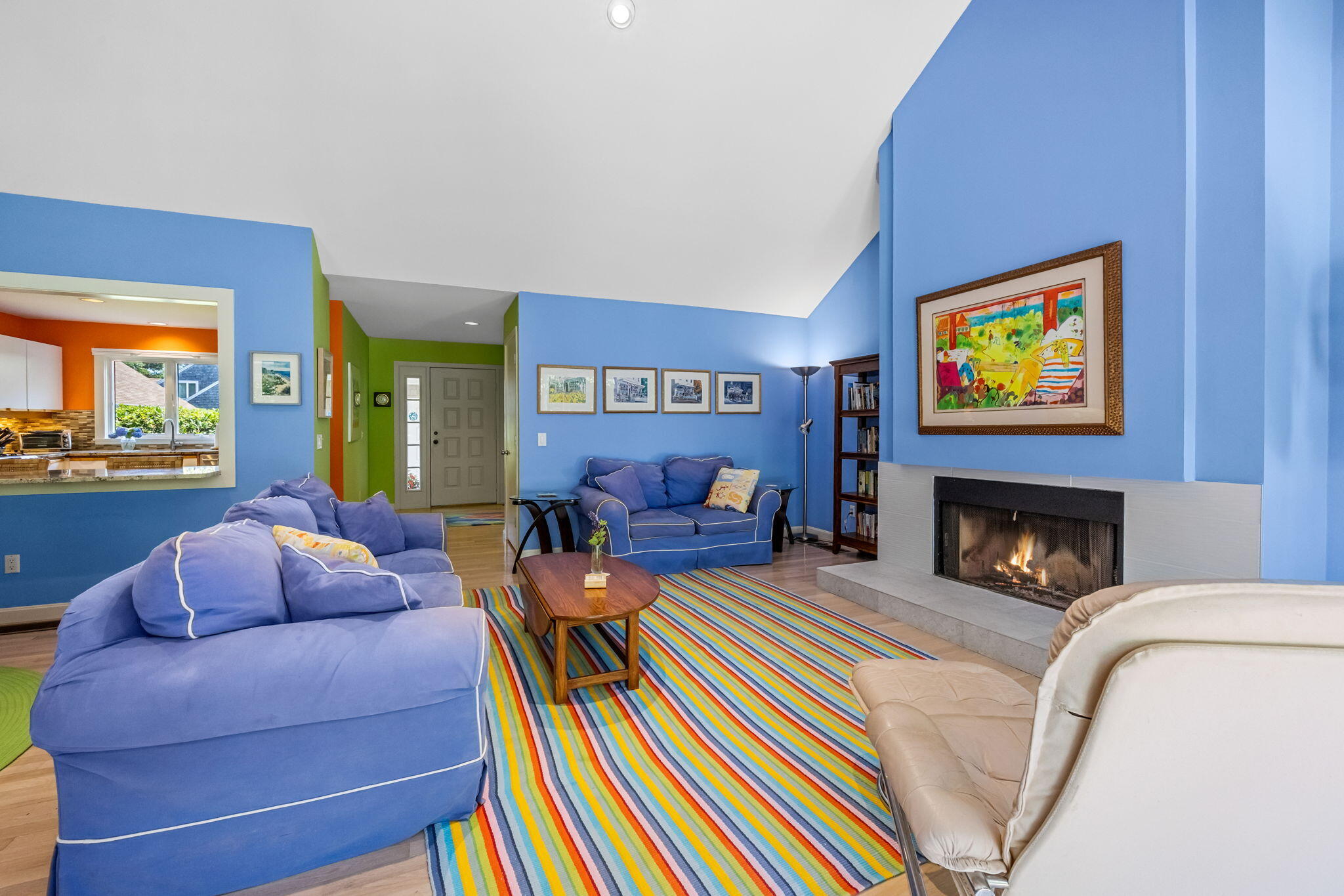 11 Juniper Circle, Unit 11 Brewster, MA 02631 - Photo 8 of 52 a living room with furniture and a fireplace