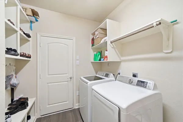 a utility room with dryer and washer