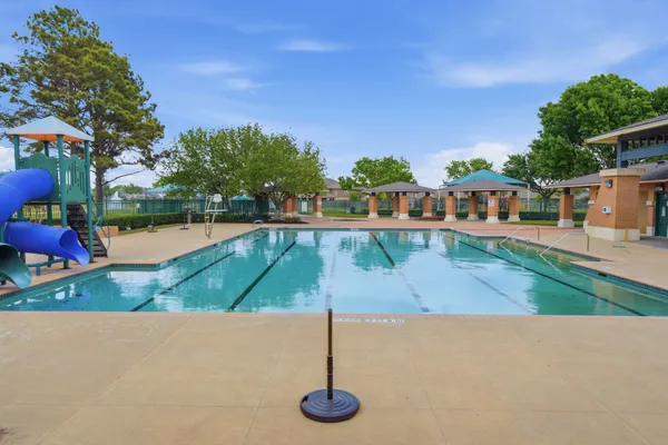 a view of swimming pool in a yard