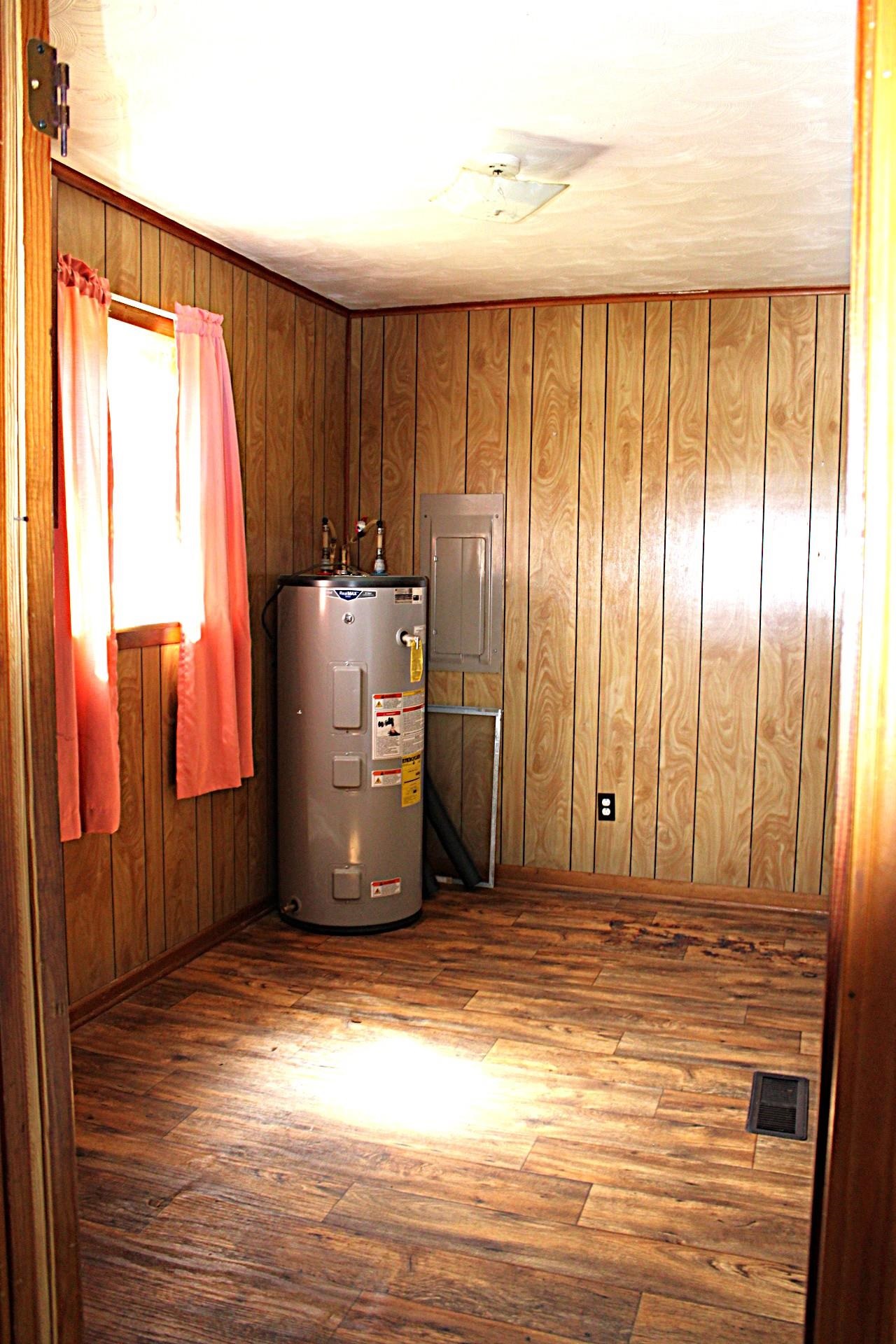 584 Chisholm Lake Road Ripley, TN 38063 - Photo 11 of 28 a view of a utility room with a window