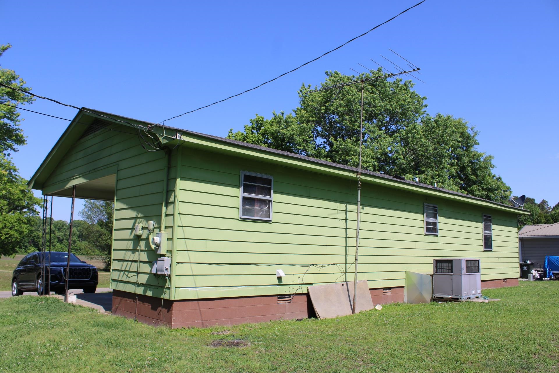 584 Chisholm Lake Road Ripley, TN 38063 - Photo 24 of 28 a view of backyard with sitting area