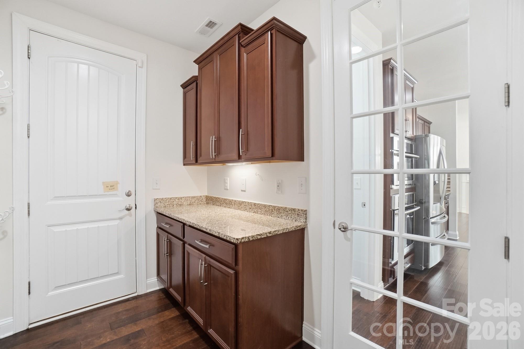 220 Morgan's Branch Road Belmont, NC 28012 - Photo 34 of 42 a kitchen with a refrigerator and cabinets