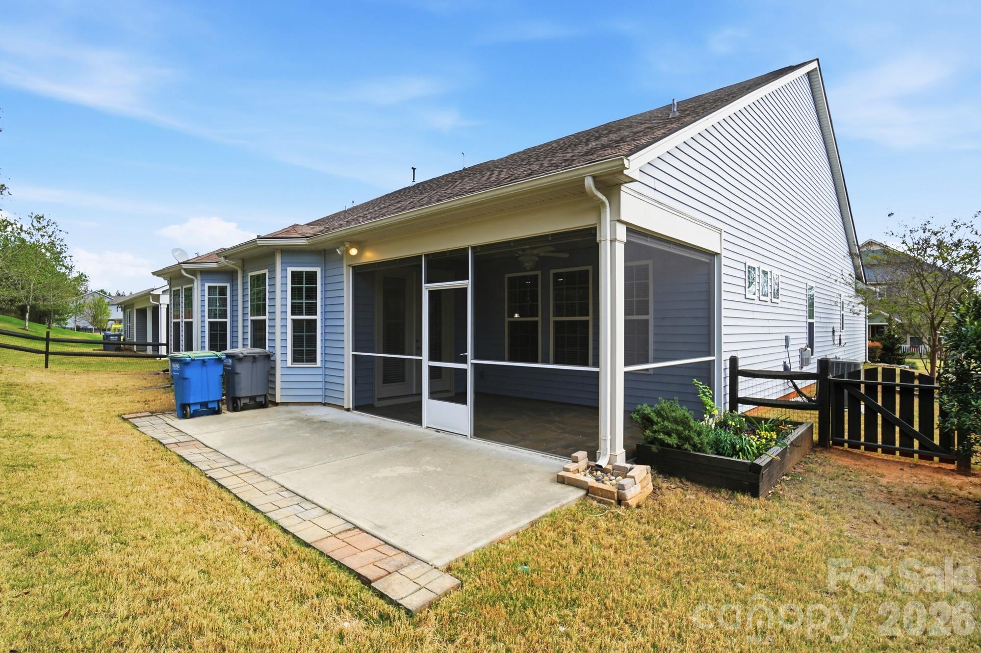 220 Morgan's Branch Road Belmont, NC 28012 - Photo 39 of 42 a view of house with backyard and sitting area