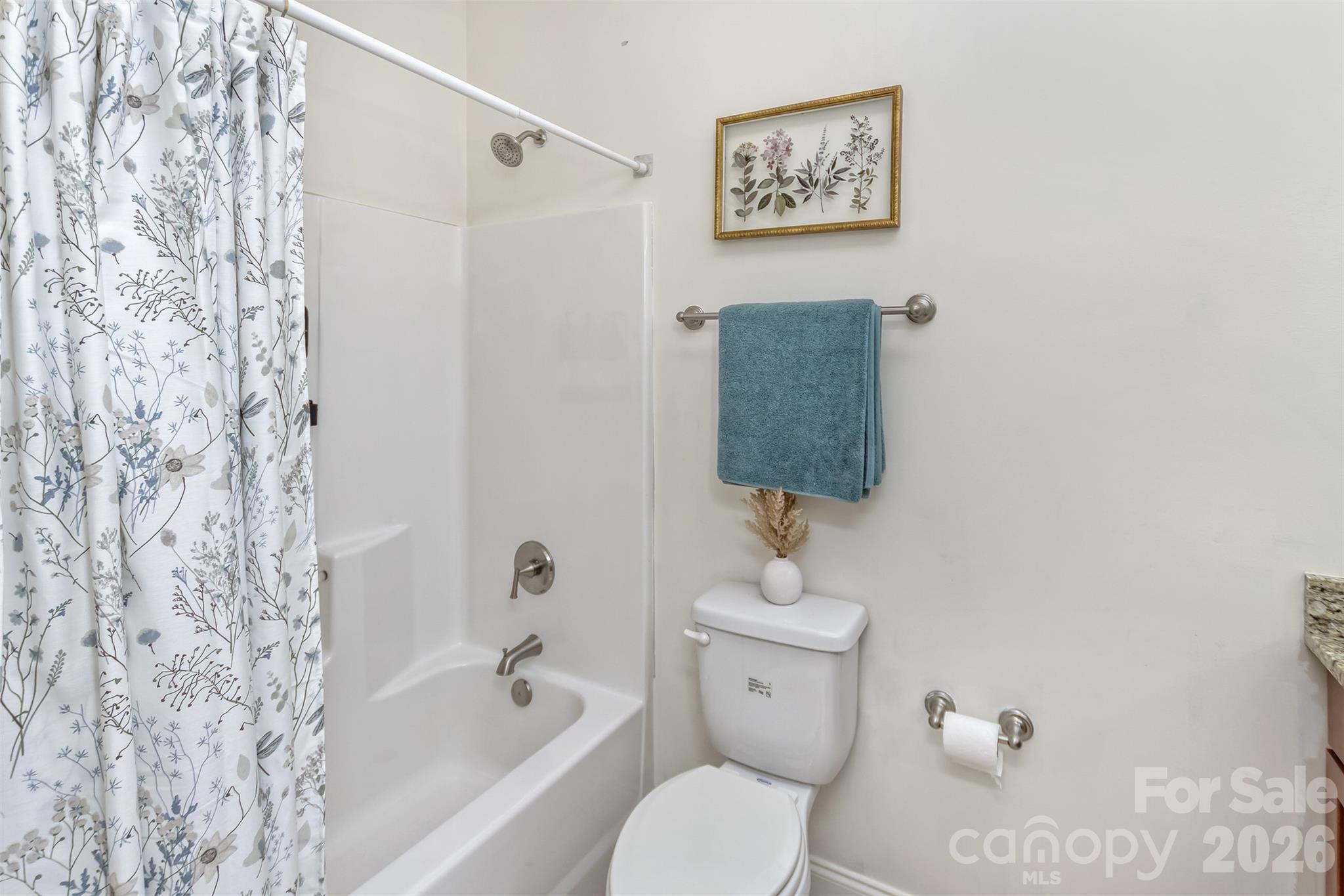 84 Rose Creek Road Leicester, NC 28748 - Photo 24 of 28 a bathroom with a toilet sink and bathtub