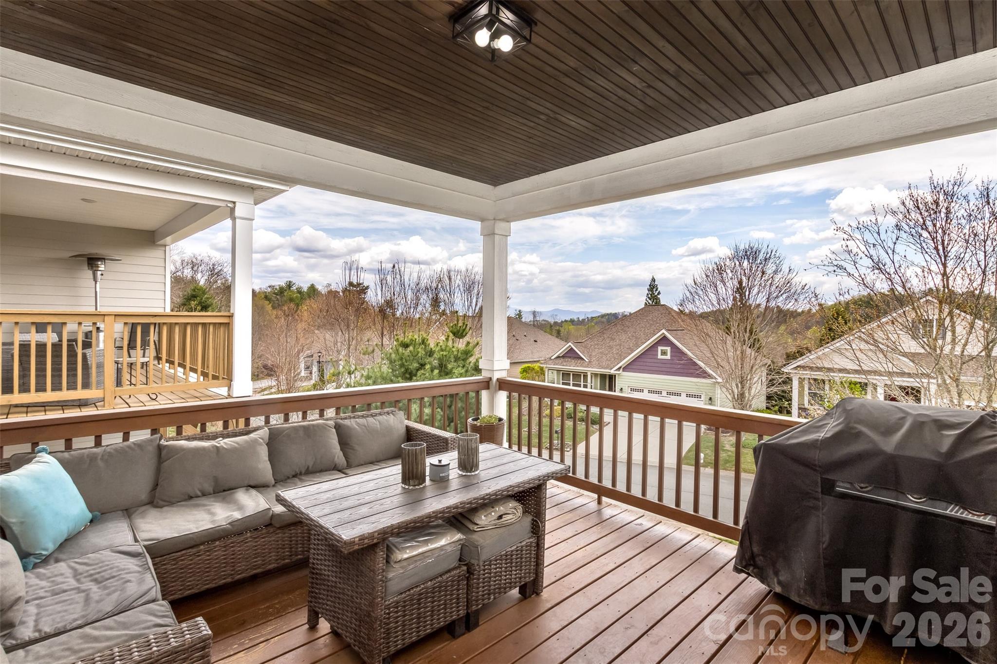 84 Rose Creek Road Leicester, NC 28748 - Photo 28 of 28 a view of a chairs in the roof deck