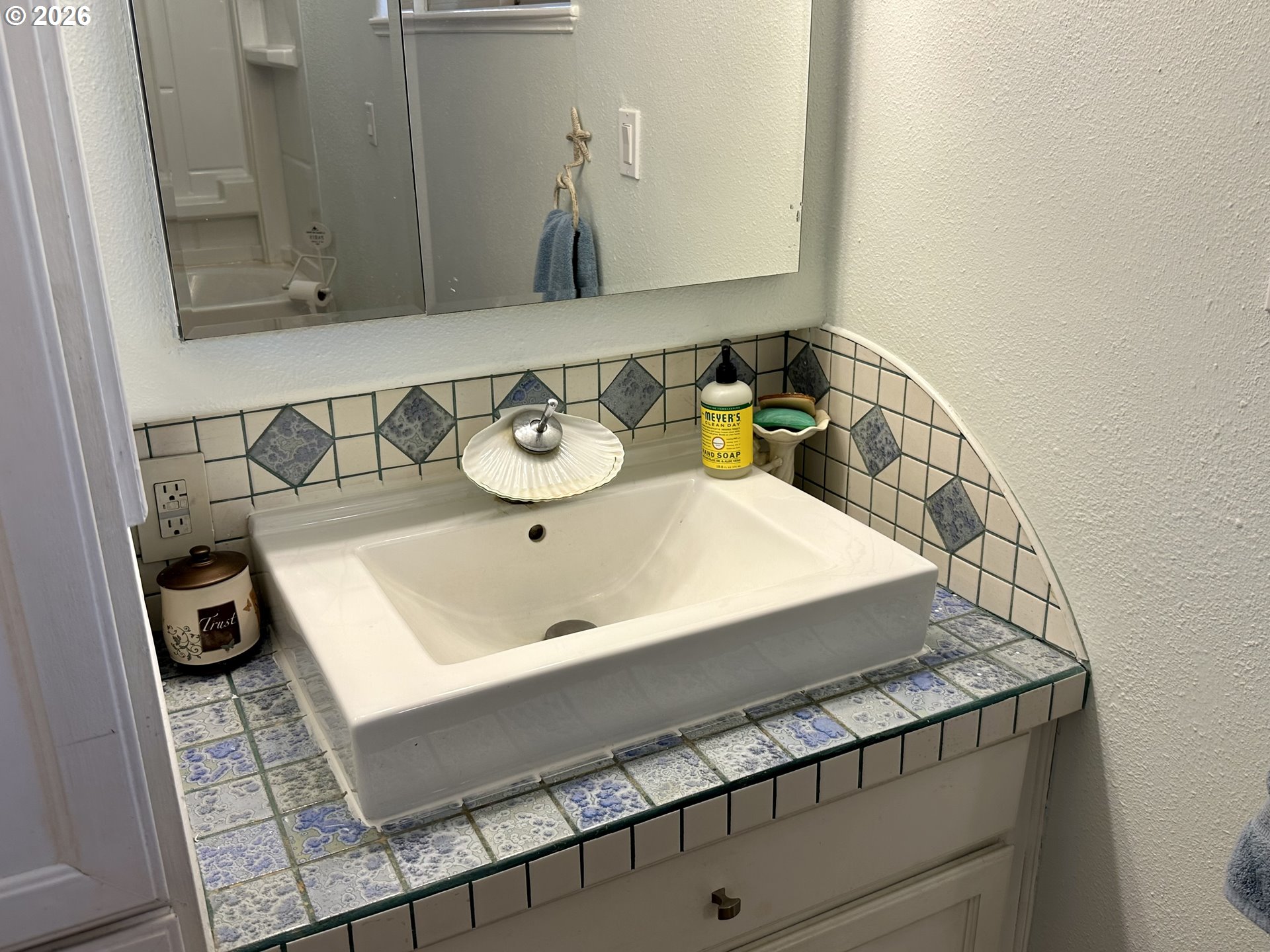 5664 Highbanks Road Springfield, OR 97478 - Photo 20 of 48 a bathroom with a sink and a mirror
