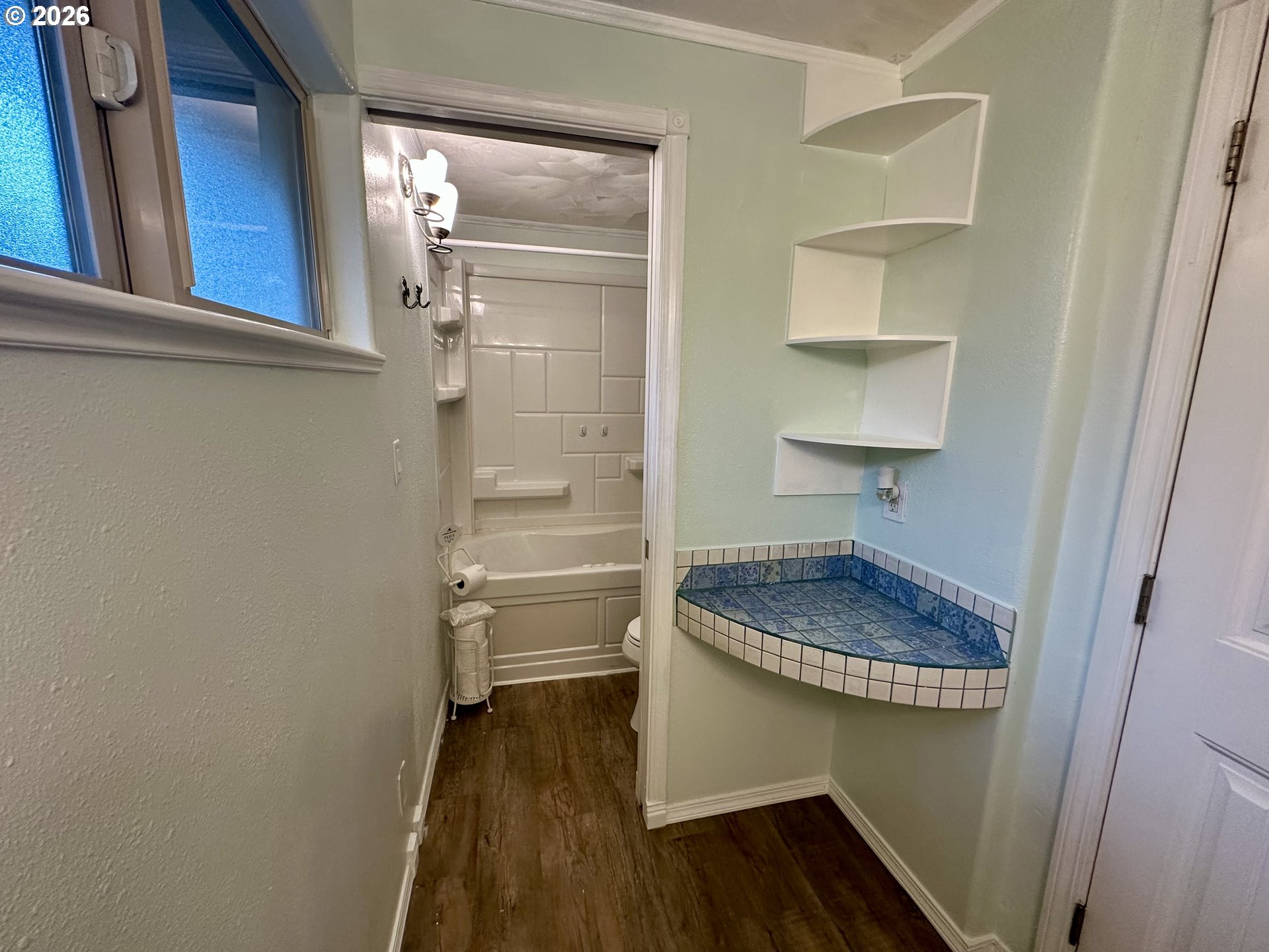 5664 Highbanks Road Springfield, OR 97478 - Photo 21 of 48 a bathroom with a granite countertop sink and a mirror