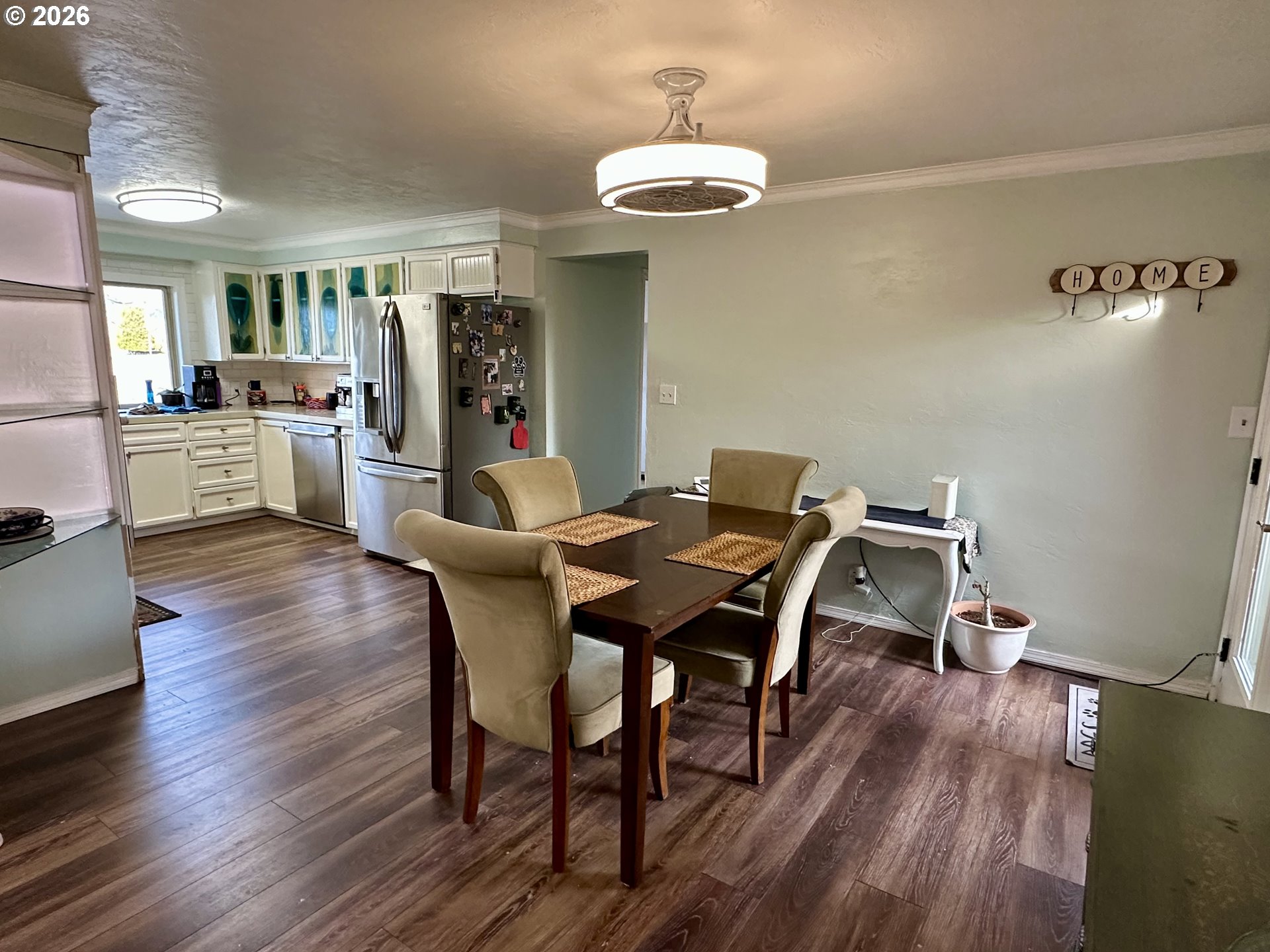 5664 Highbanks Road Springfield, OR 97478 - Photo 27 of 48 a view of a dining room with furniture and wooden floor