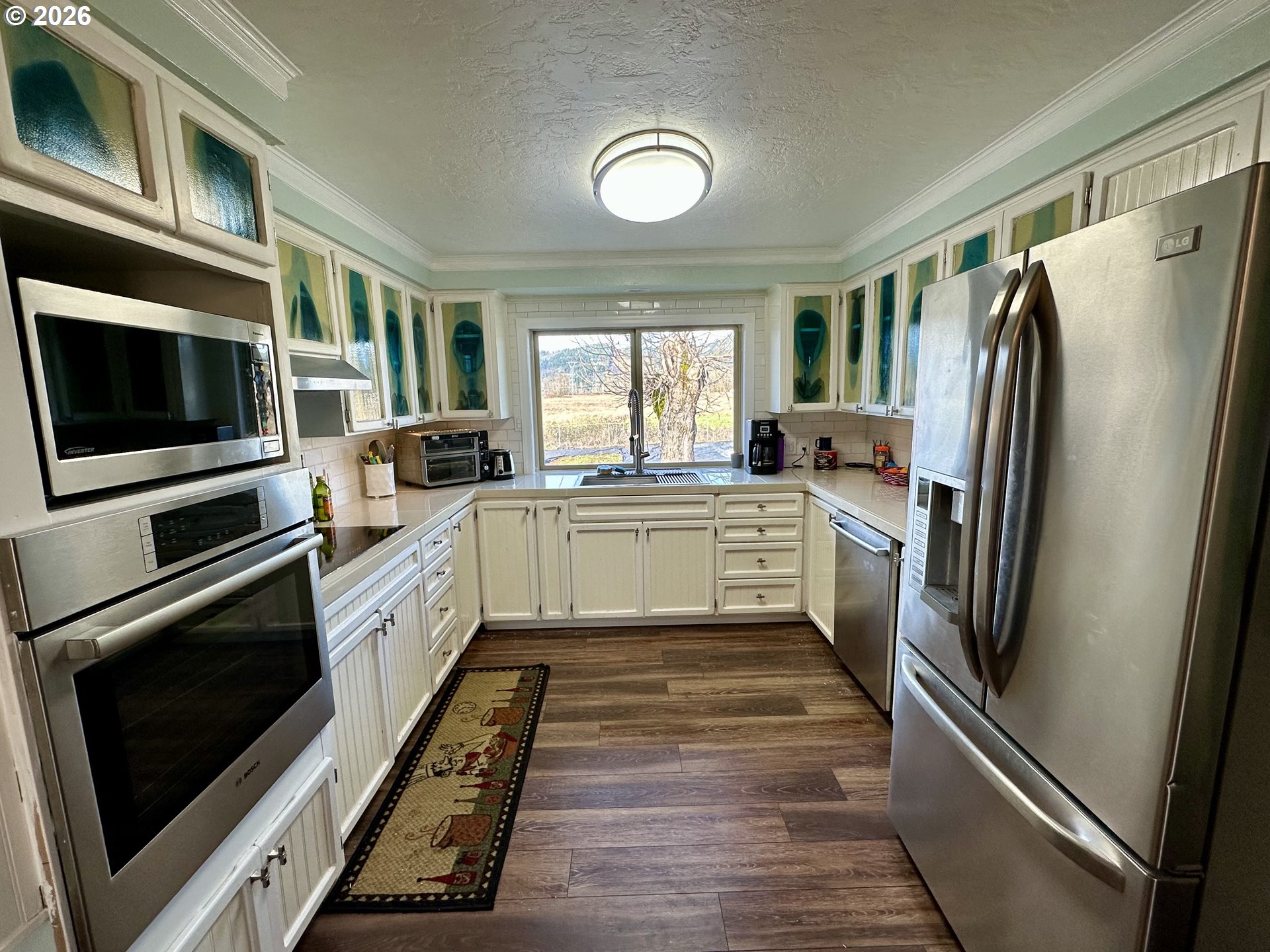 5664 Highbanks Road Springfield, OR 97478 - Photo 29 of 48 a kitchen with stainless steel appliances a stove a sink and a refrigerator