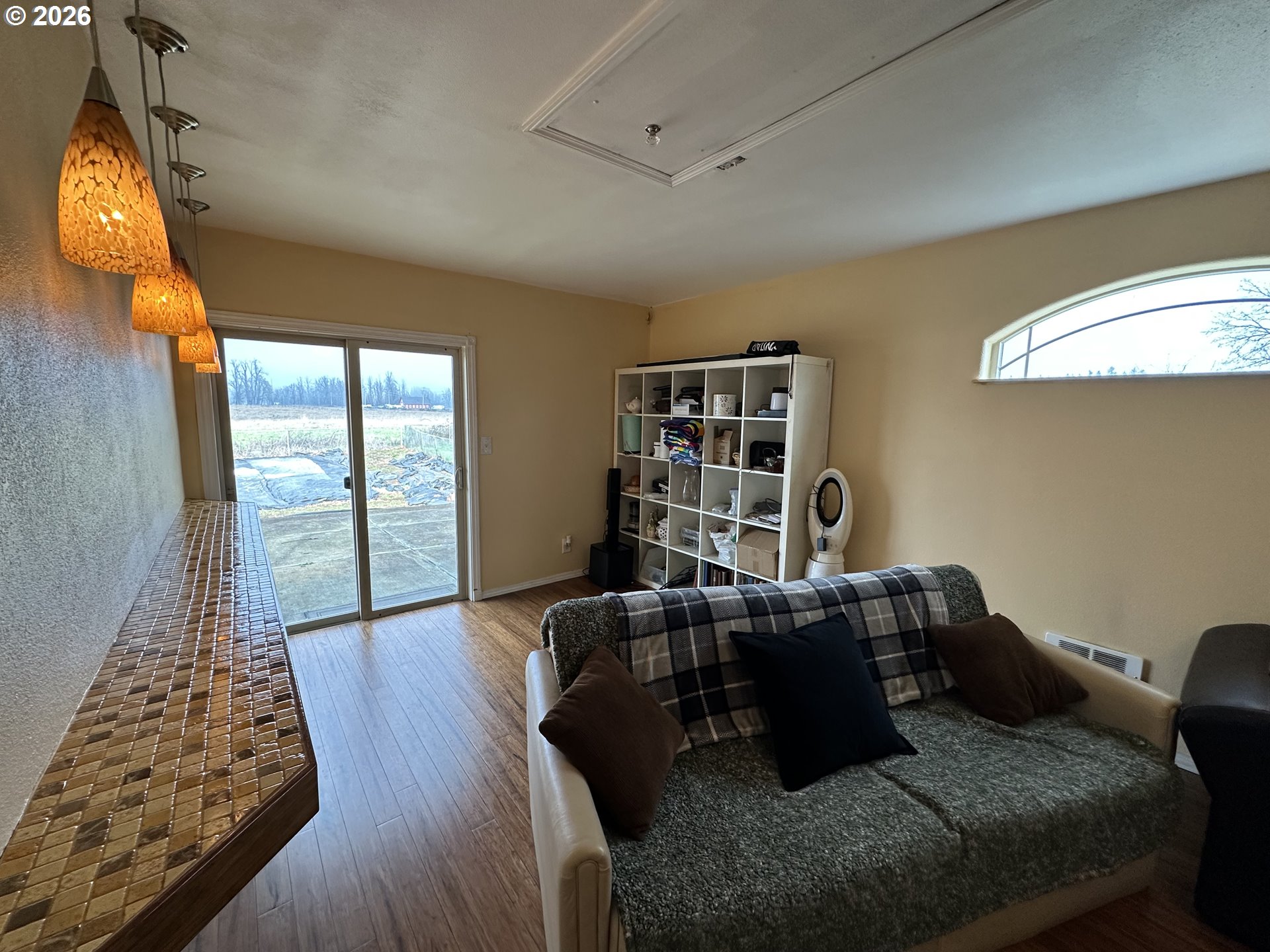 5664 Highbanks Road Springfield, OR 97478 - Photo 41 of 48 a living room with furniture fireplace and a large window