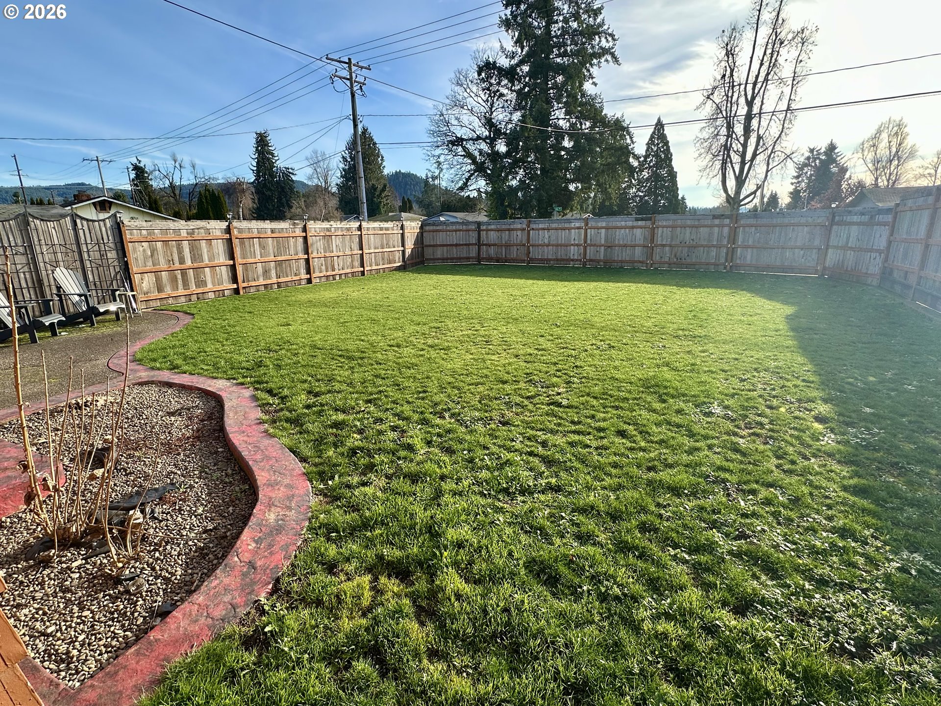 5664 Highbanks Road Springfield, OR 97478 - Photo 8 of 48 a view of a swimming pool with a yard