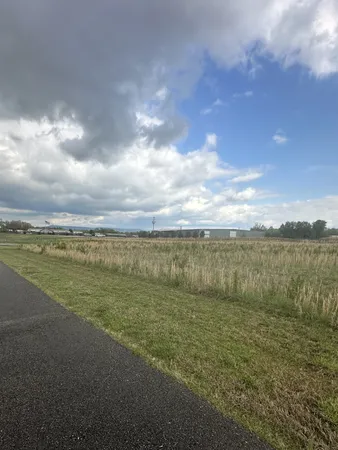 a view of balcony with two chairs